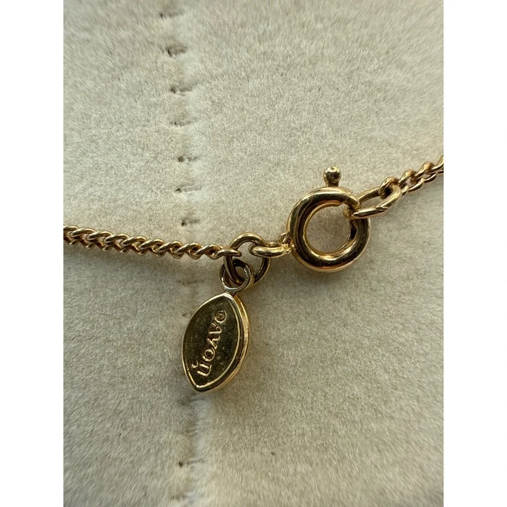 Avon gold tone